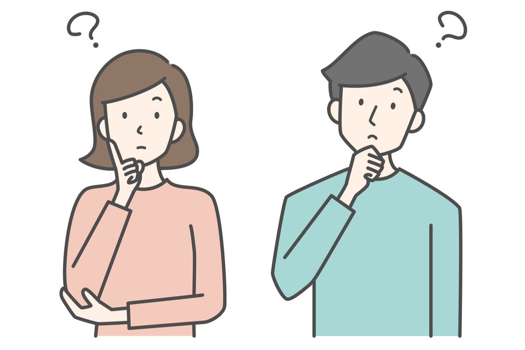 首を傾げている女性と男性のイラスト